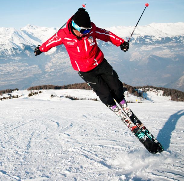 Learn the perfect style with your instructor at Veysonnaz swiss ski school